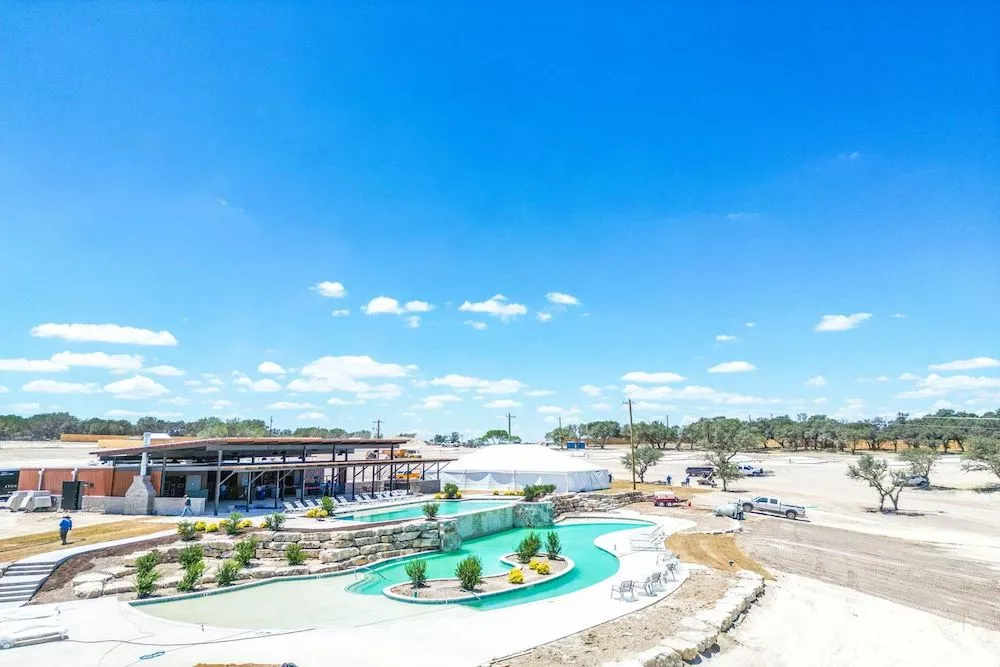 community pool and clubhouse at Firefly Resort in Fredericksburg