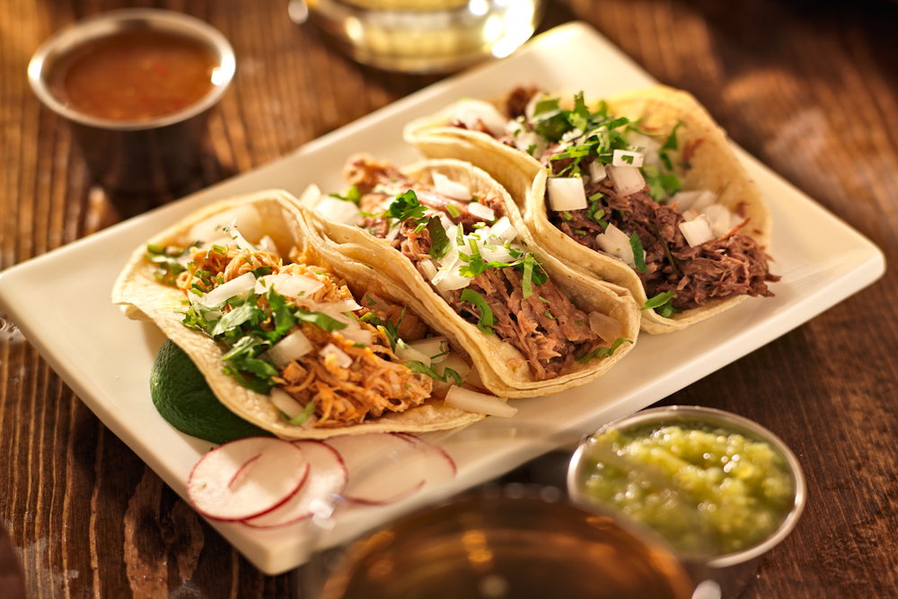 authentic Mexican tacos with chicken, carnitas, and barbacoa