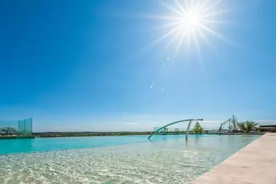 Up-close view of the community swimming pool at Firefly Resort 