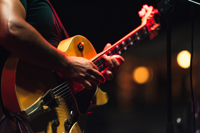 musician playing guitar