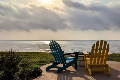 chairs looking out onto ocean