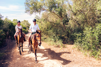 couple riding horses