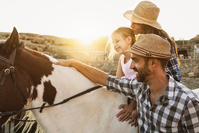 family horseback riding in TX