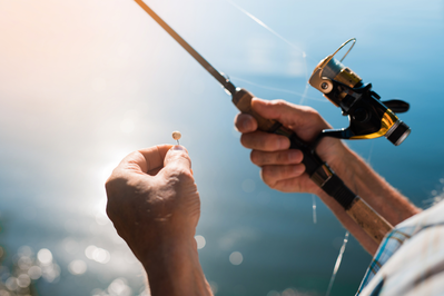 person fishing on sunny day